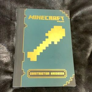 paperback Minecraft book. (Construction Handbook)